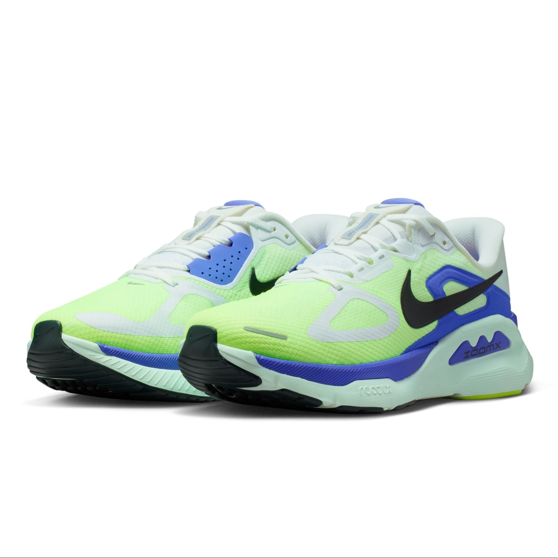 Pair of neon green and blue Nike sneakers on a white background