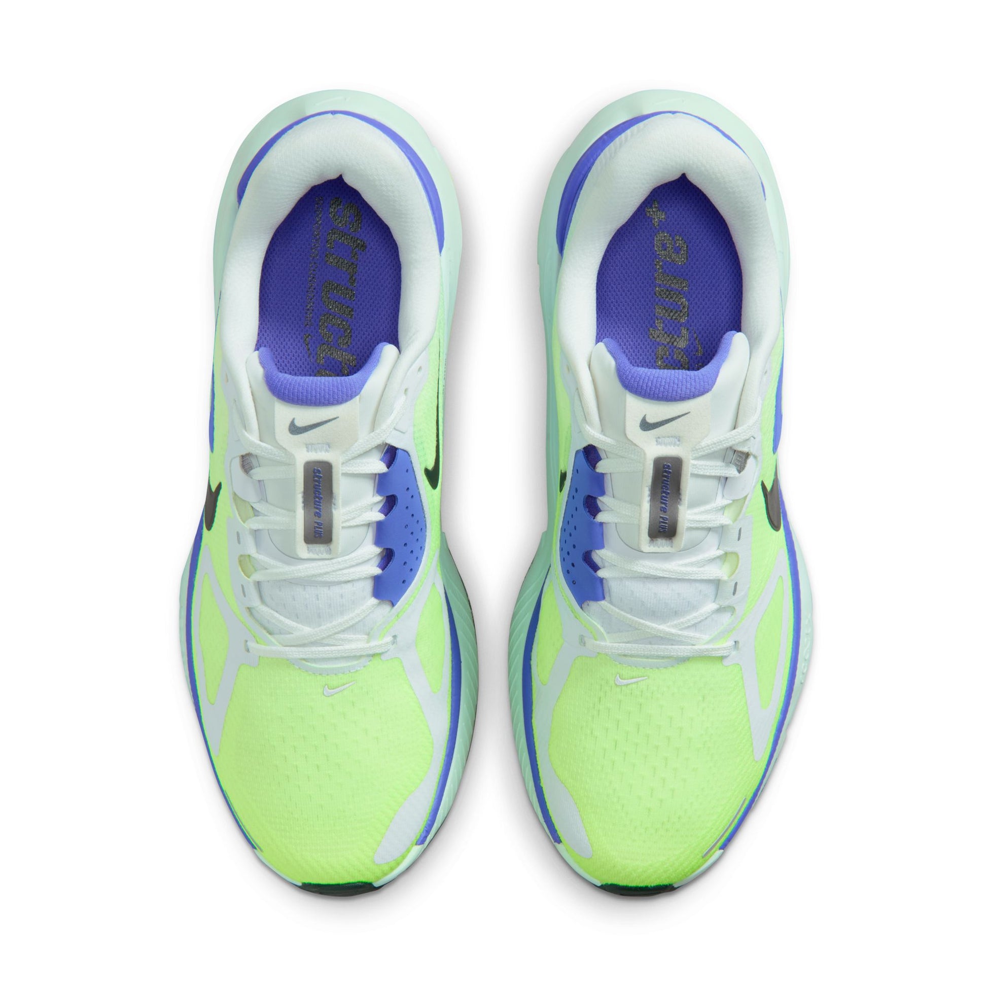 Pair of neon green and white running shoes with purple accents on a white background