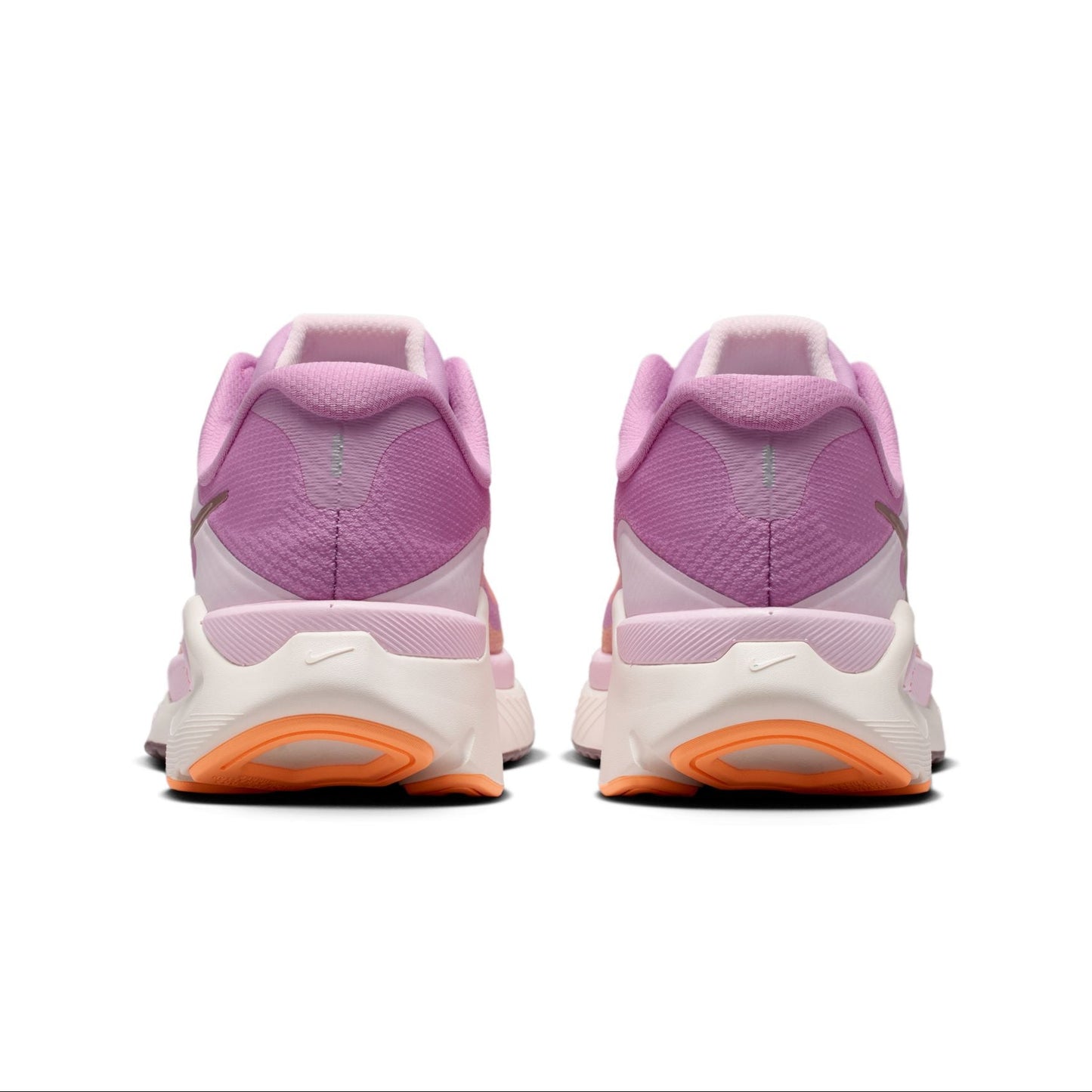 Pair of pink and orange running shoes on a white background