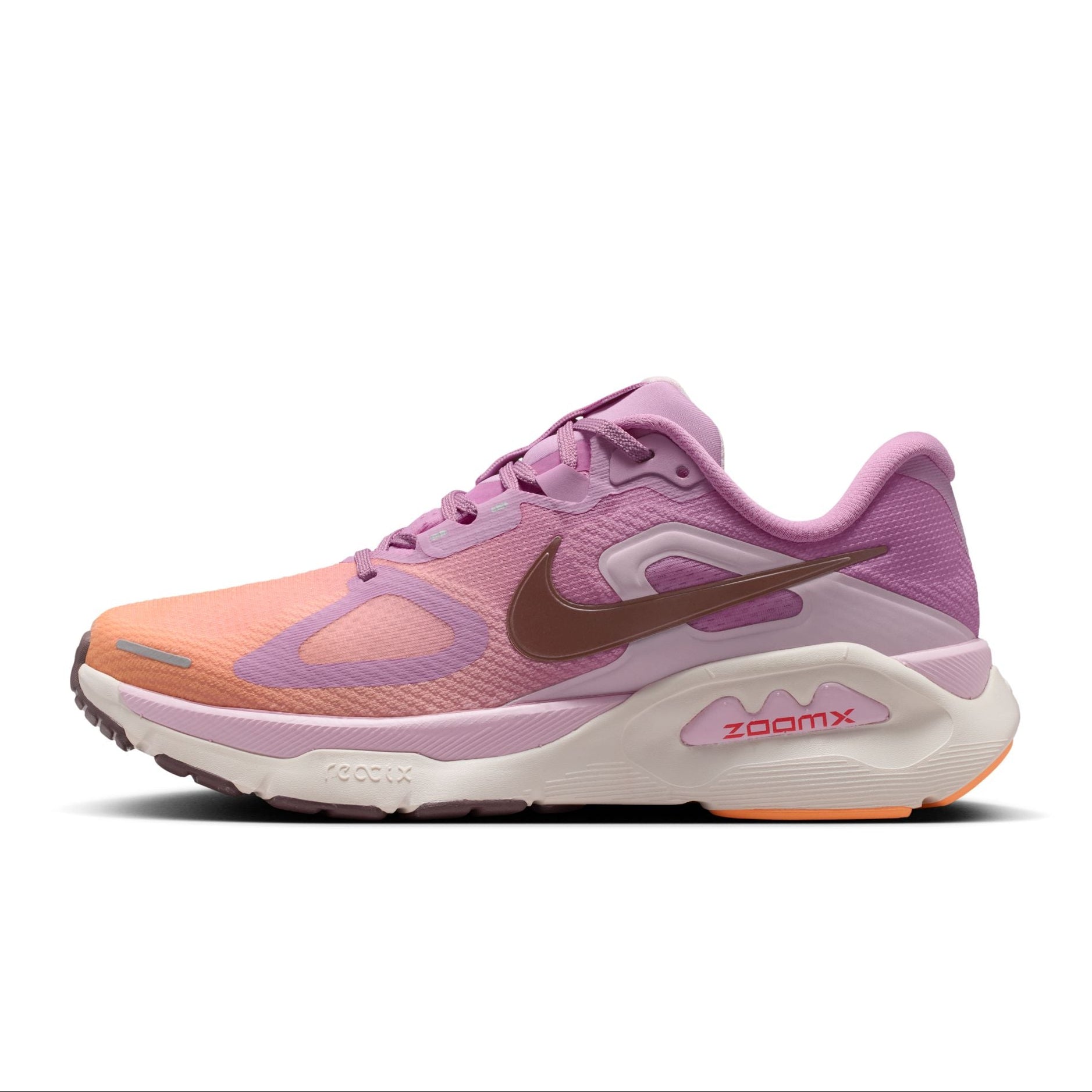 Pink and orange running shoe with Nike logo on a white background