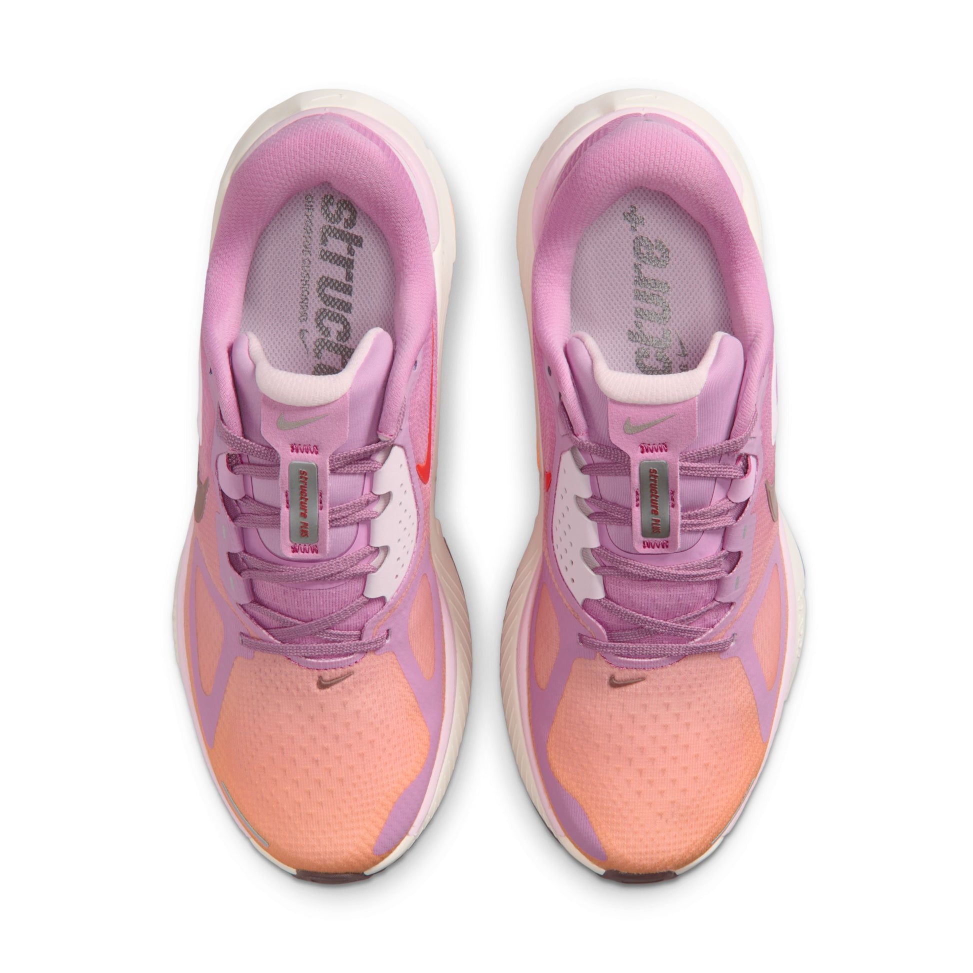 Pink and orange running shoes with visible brand logo on a white background