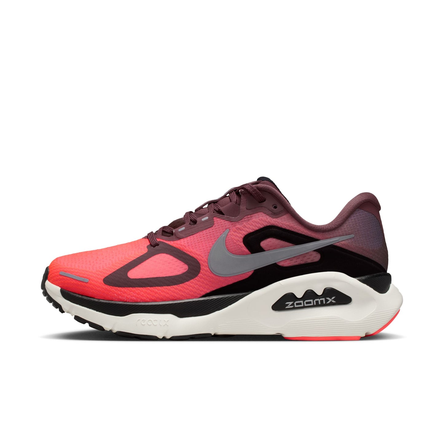 Red and black running shoe with Nike logo on a white background
