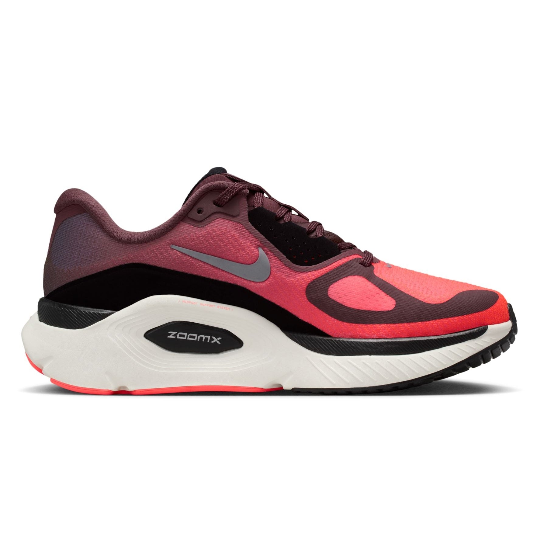 Red and black running shoe with Nike logo on a white background