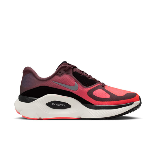 Red and black running shoe with Nike logo on a white background