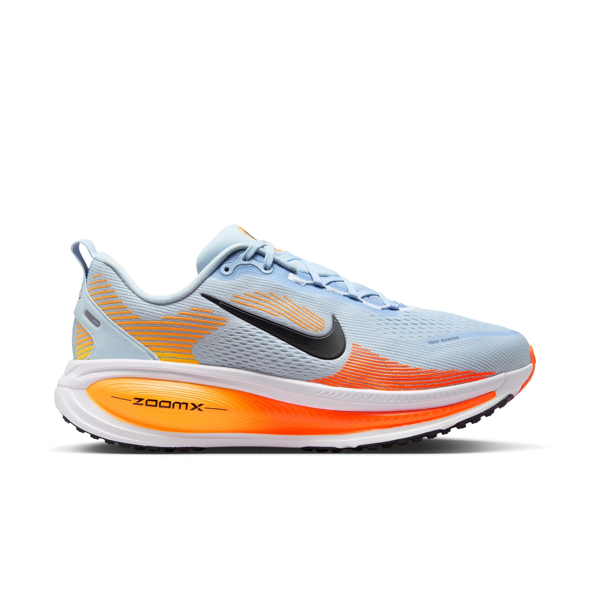 Blue running shoe with orange sole on a white background