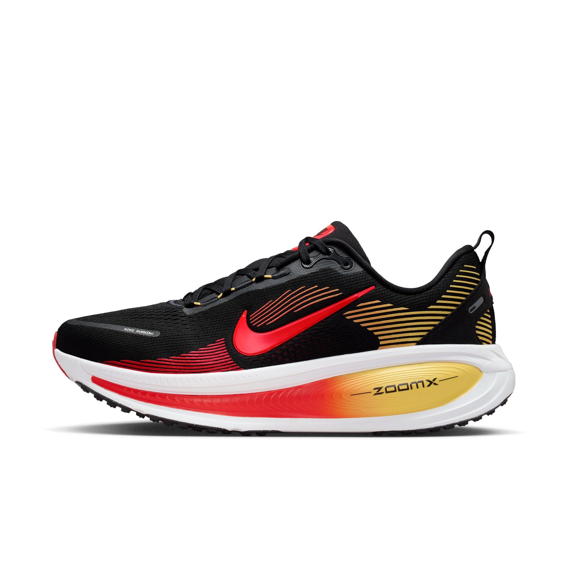 Black, red, and yellow running shoe with 'ZoomX' on a white background