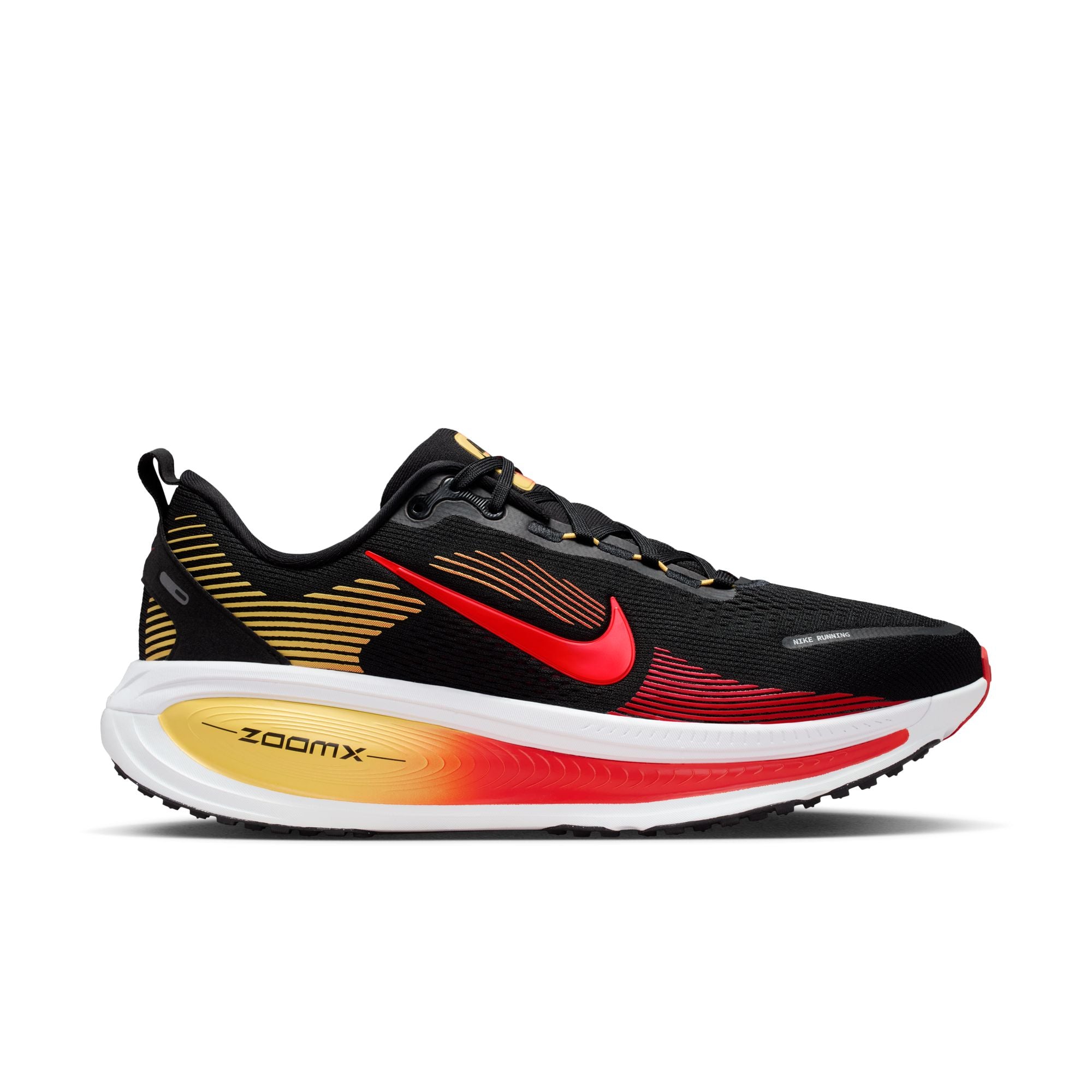 Black, red, and gold running shoe with 'zoomx' on a white background