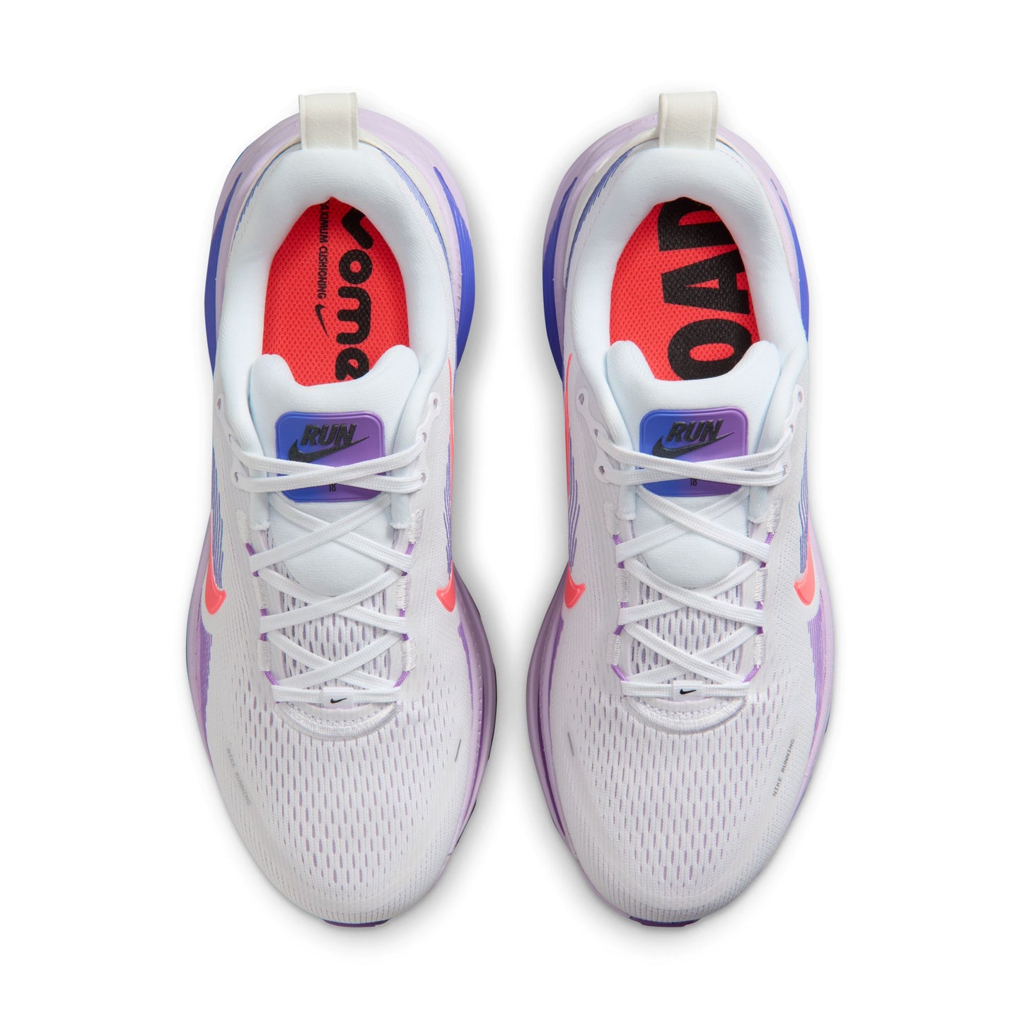 White sneakers with purple accents on a white background