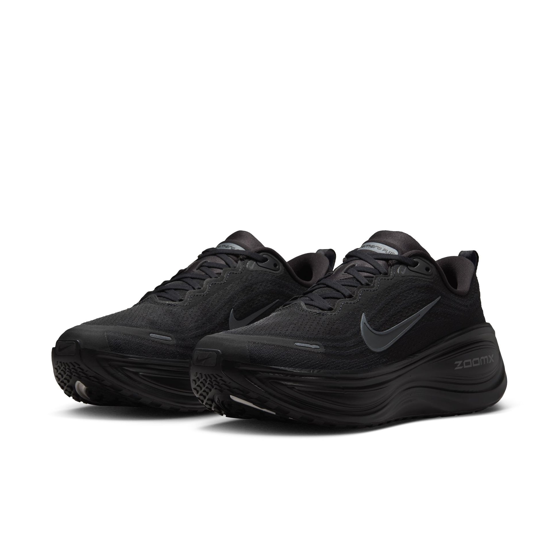 Black running shoes with Nike logo on a white background