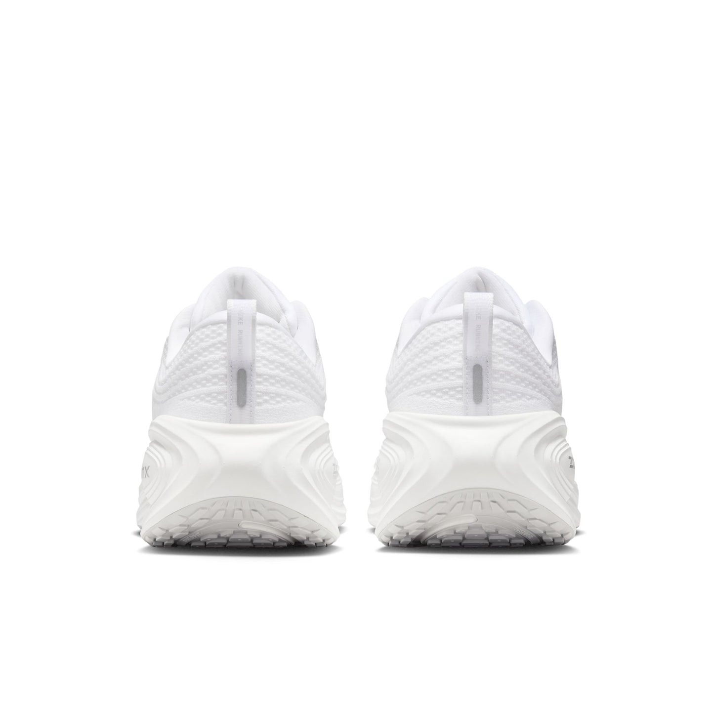 White athletic shoes on a white background