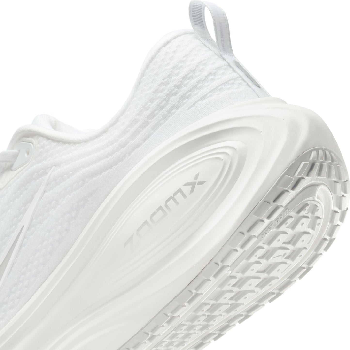 White sneaker with brand logo on a white background