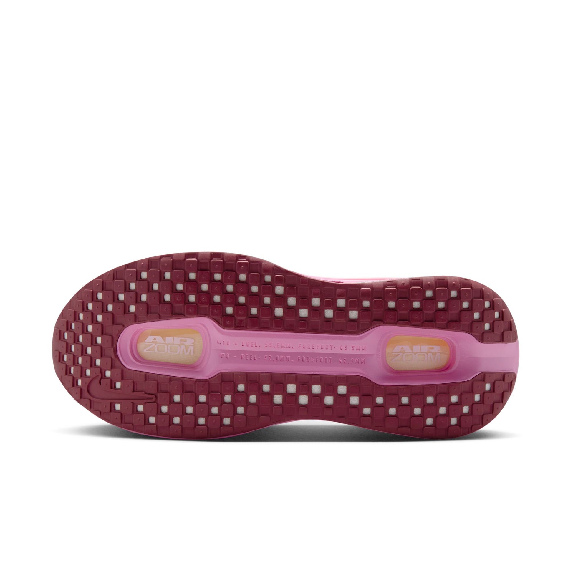 Close-up of a pink and red shoe sole on a white background