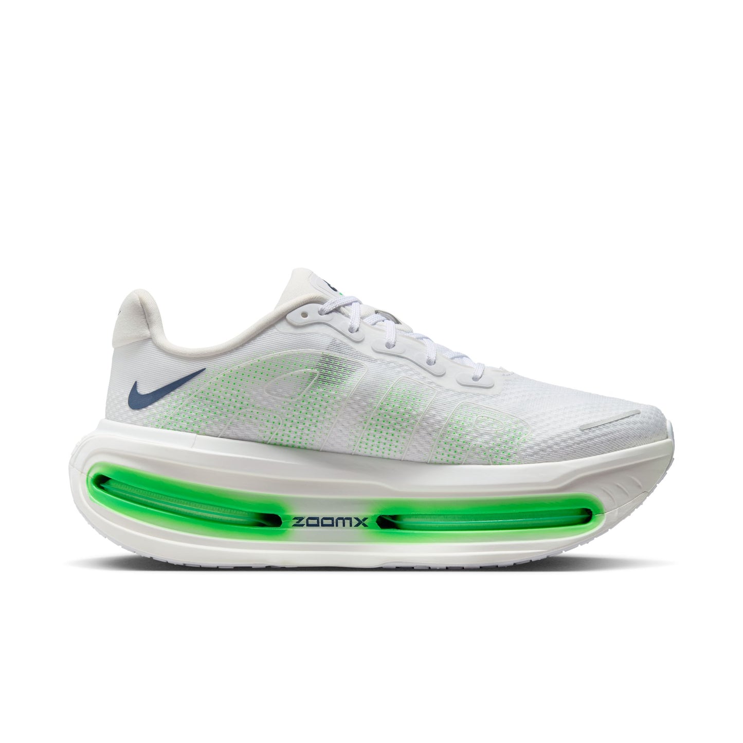 White running shoe with green sole on a white background