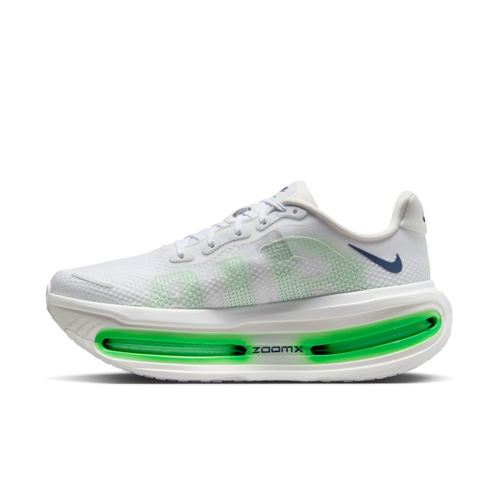White running shoe with green sole on a white background
