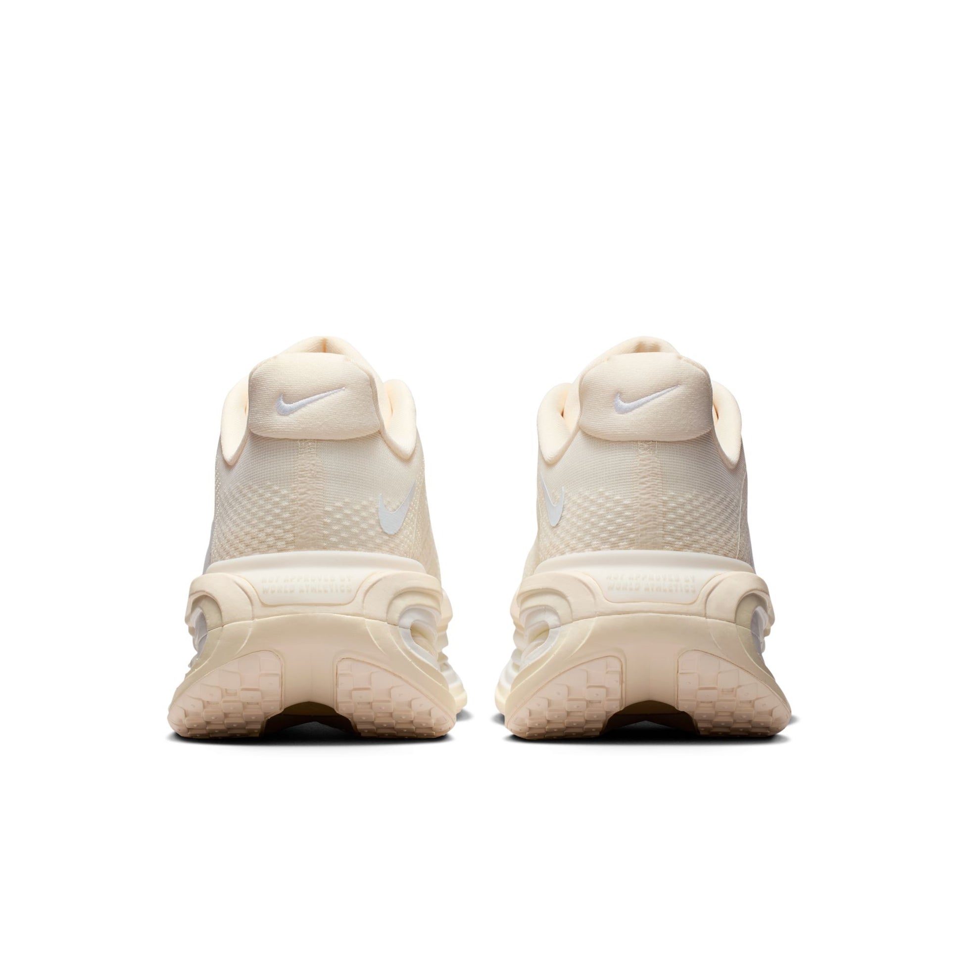 Beige sneakers with Nike logo on a white background