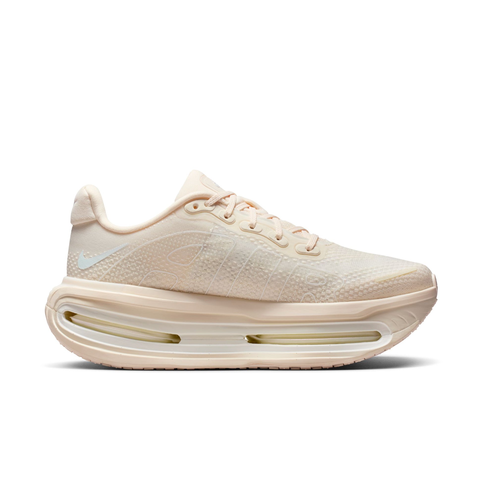 Beige running shoe with visible sole design on a white background