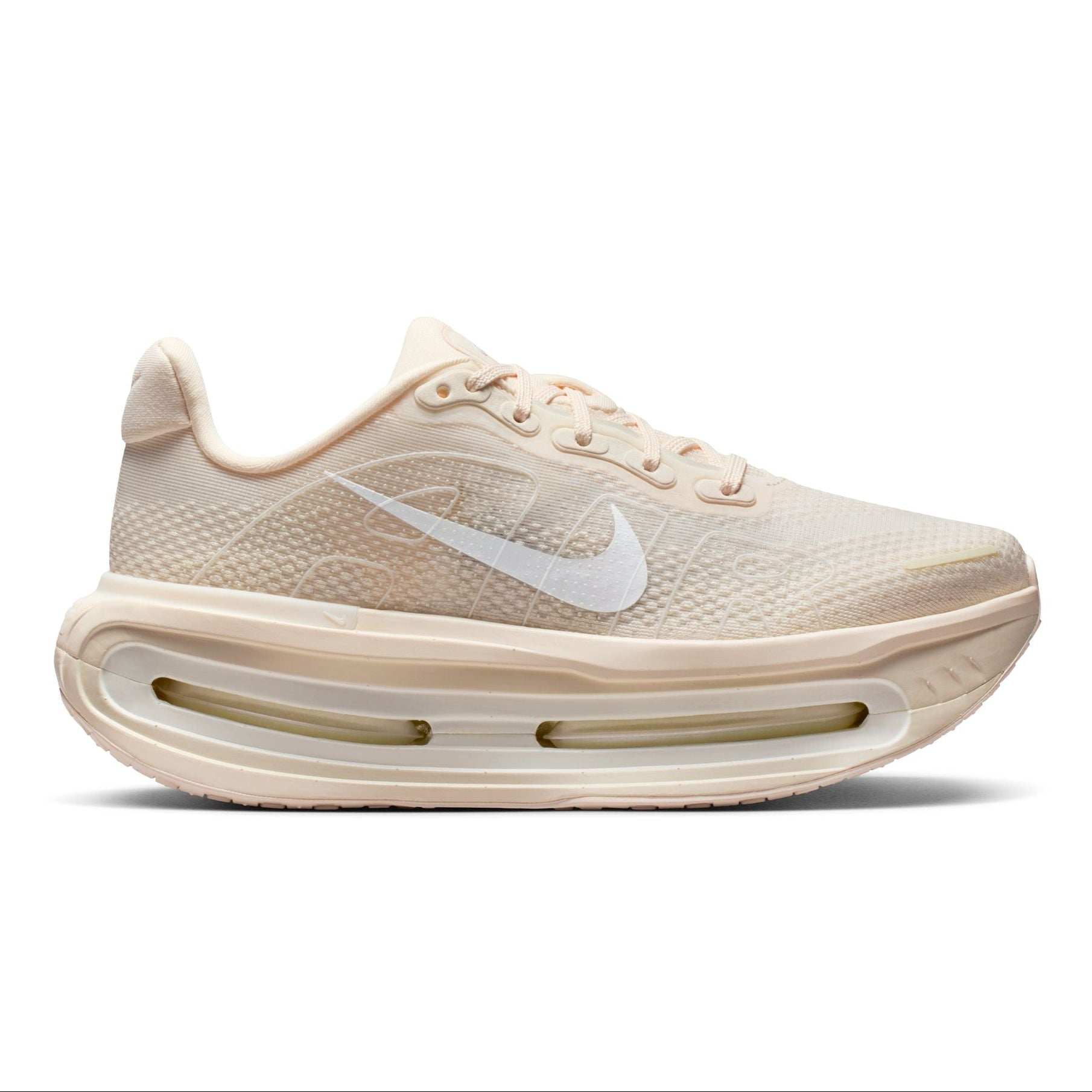 Beige running shoe with Nike logo on a white background