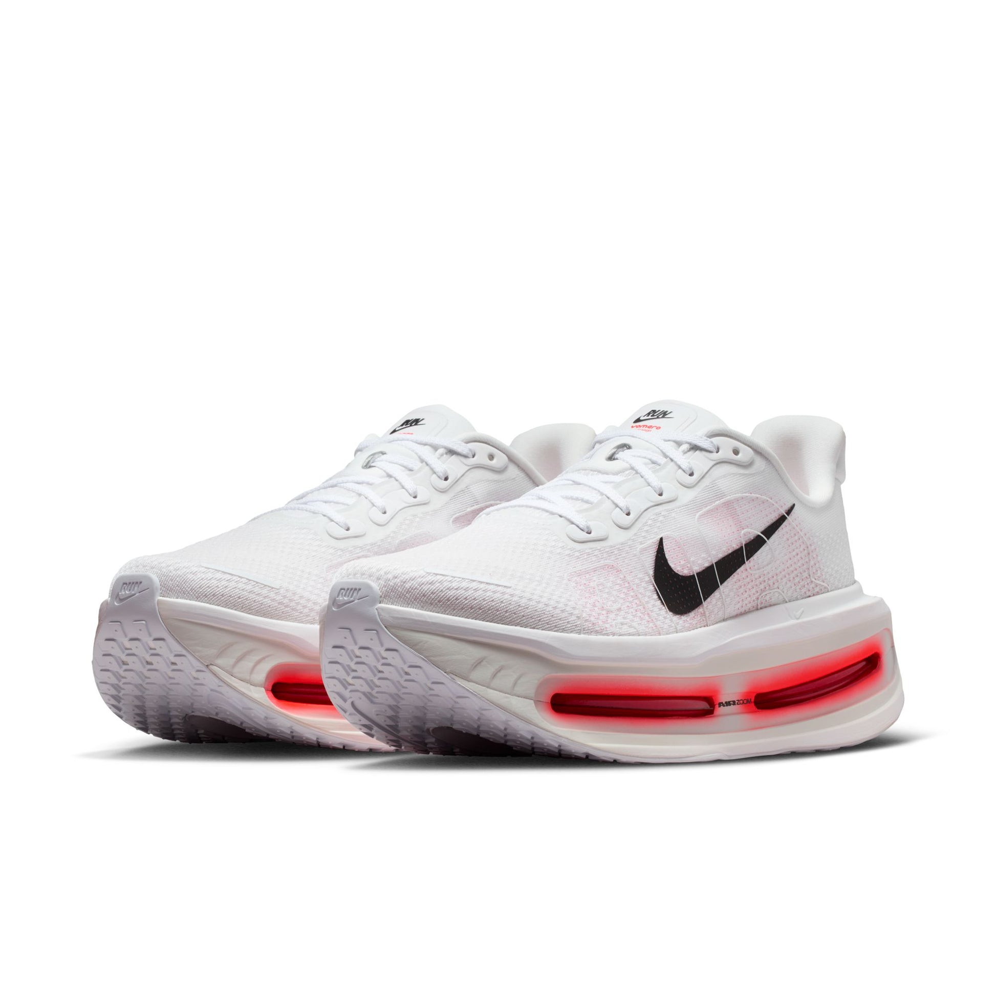 White sneakers with red air cushioning on a white background
