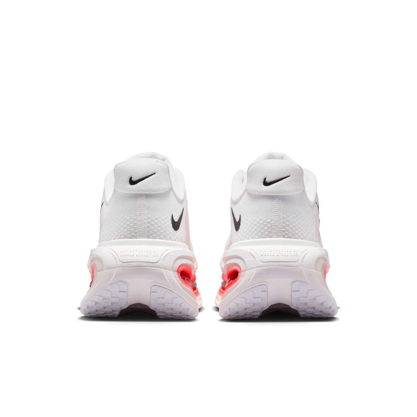 White sneakers with red accents on a white background