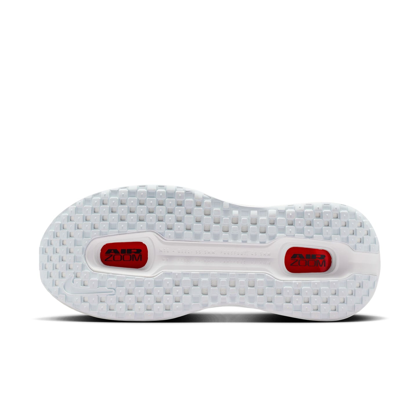 White shoe sole with red accents on a white background