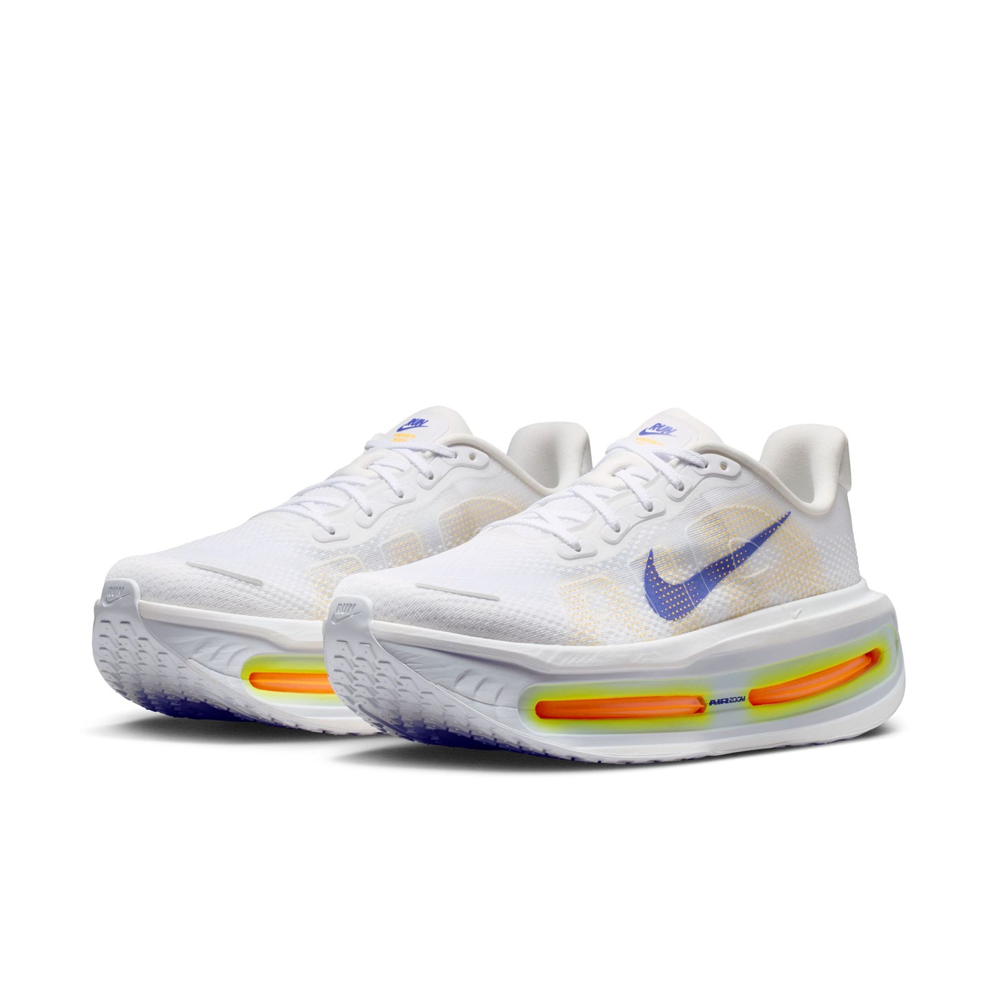 White shoe with blue, yellow orange accents on white background