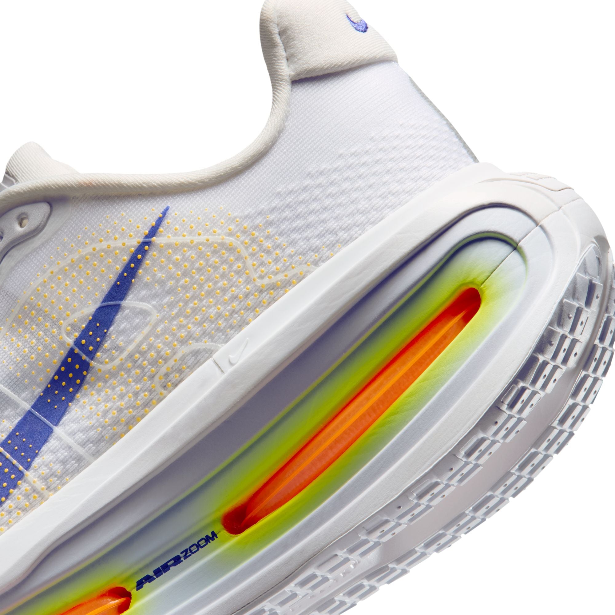 White shoe with blue, yellow orange accents on white background