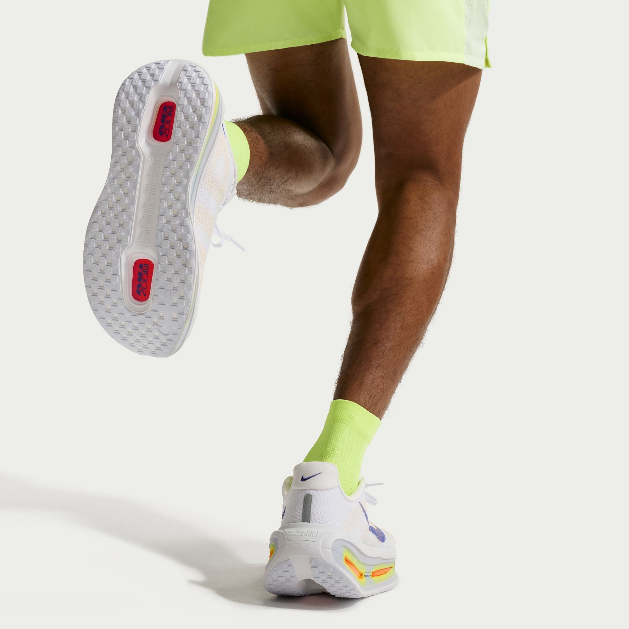 Man running in white shoes