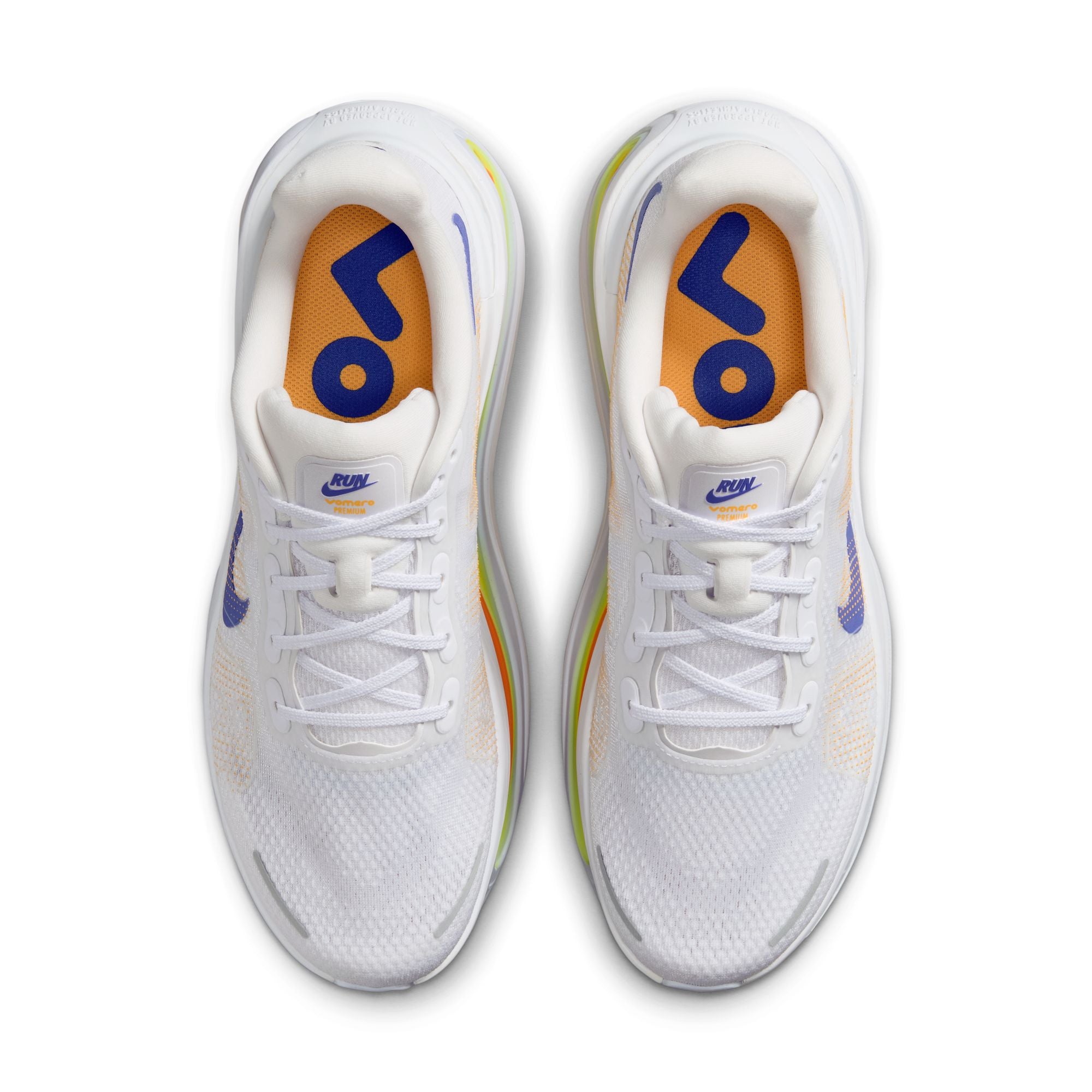 White shoe with blue, yellow orange accents on white background