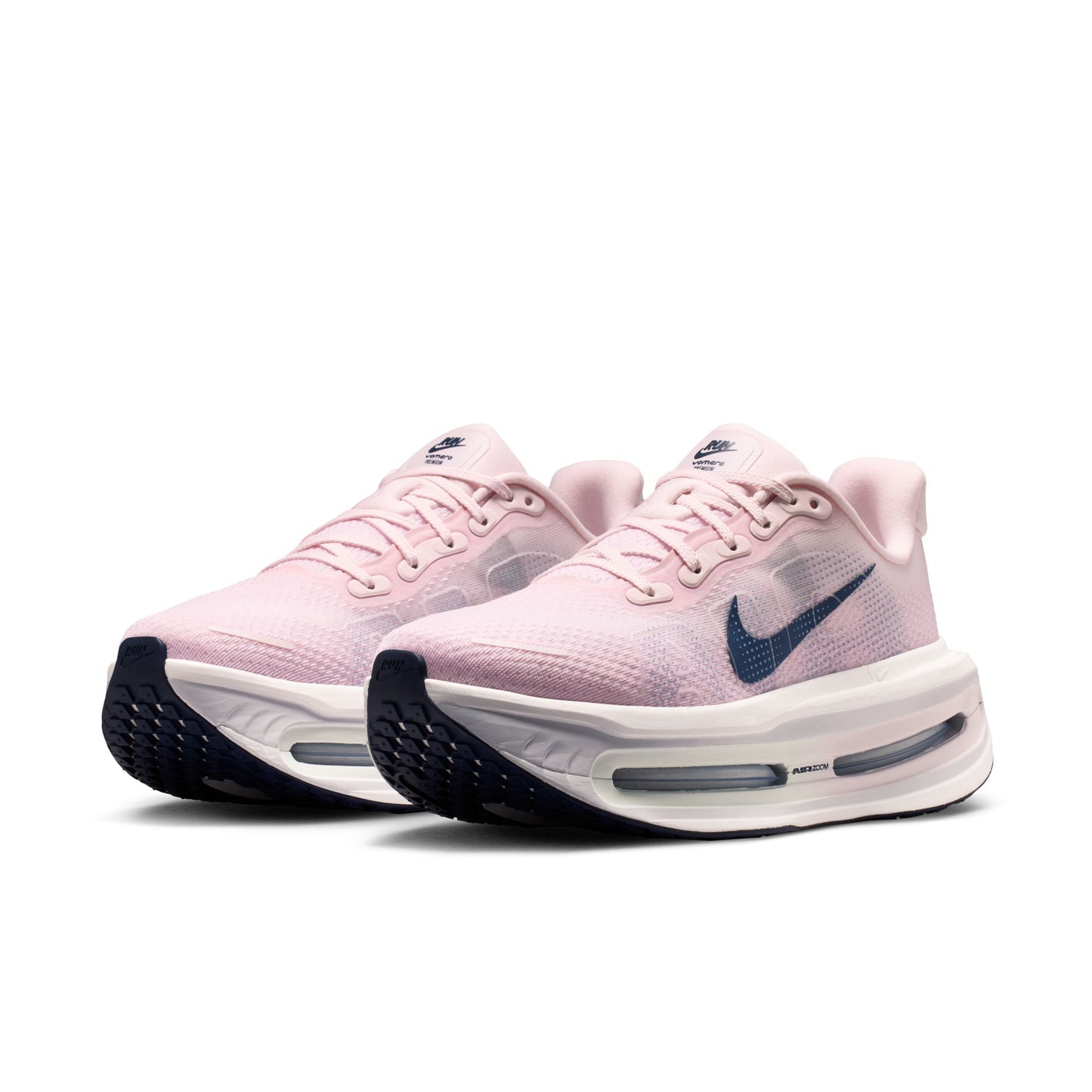 Pink shoes with blue accents on white background