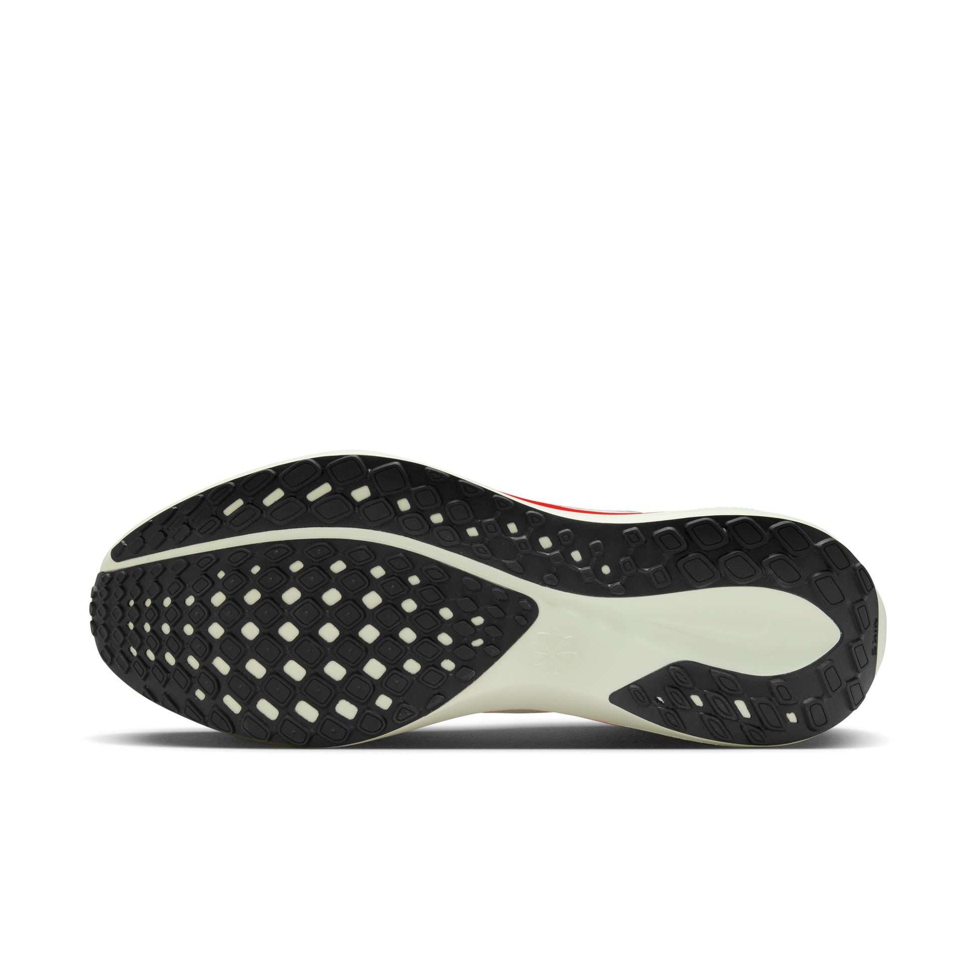 Close-up of a shoe sole with tread pattern on a white background