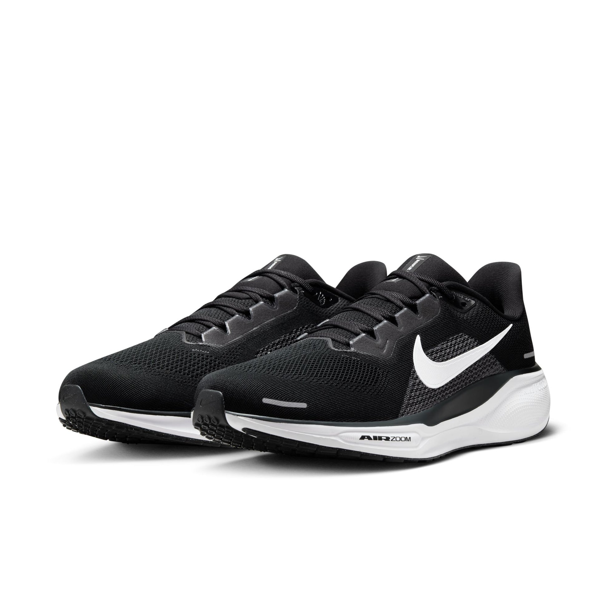 Black running shoes with white sole on a white background