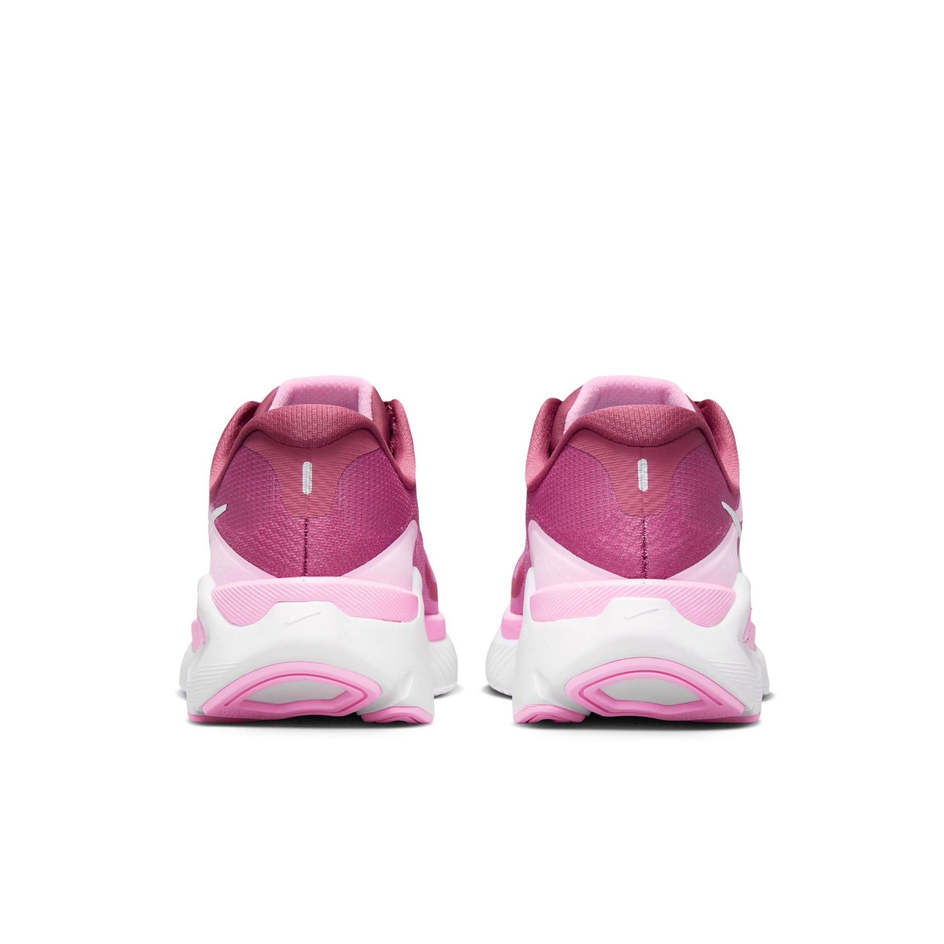 Pink and white athletic shoes on a white background
