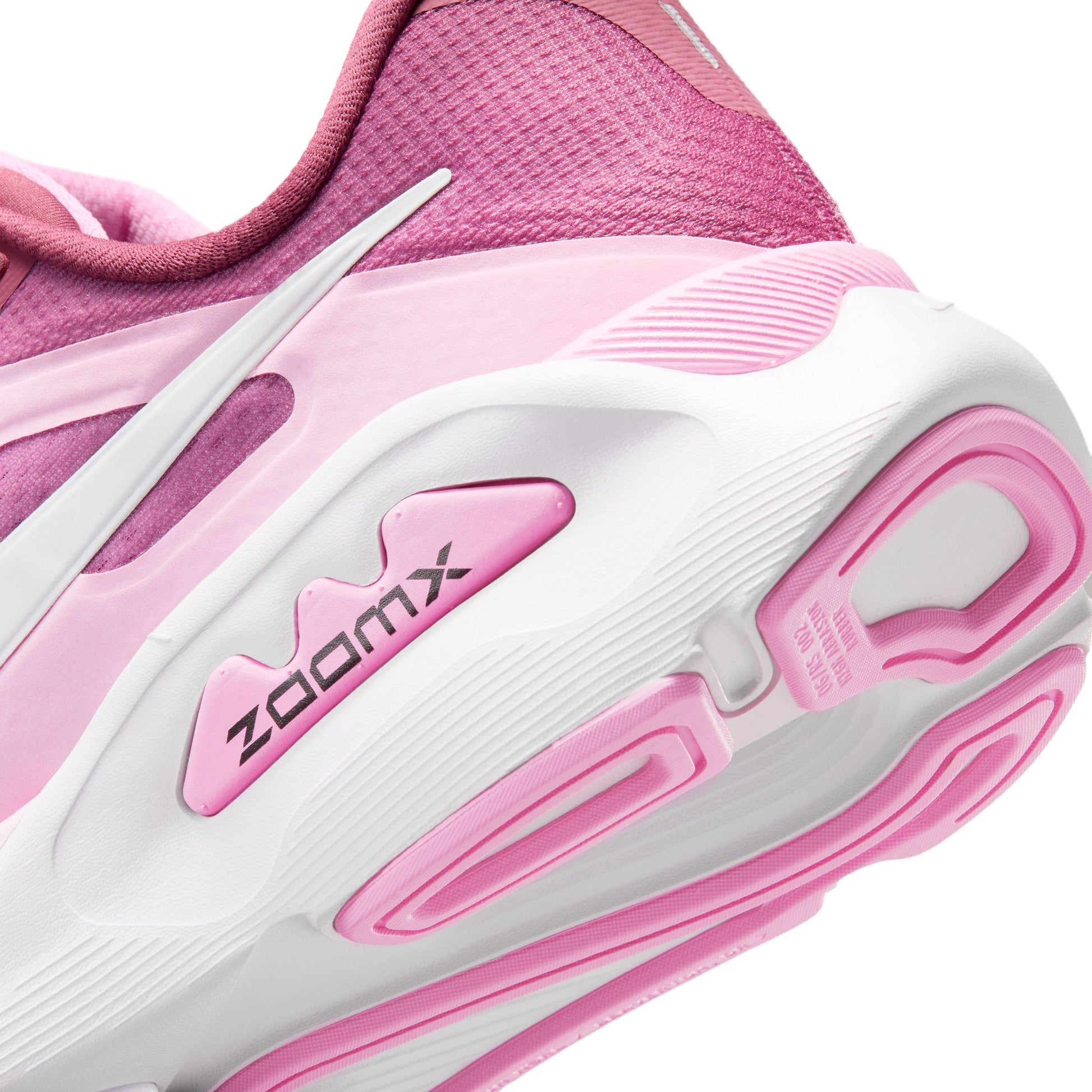 Pink and white running shoe with 'ZoomX' branding on a white background