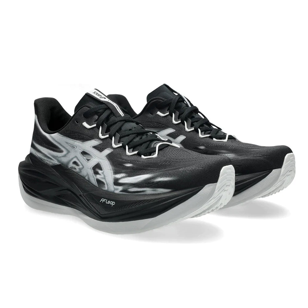 Black athletic shoes with white soles on a white background